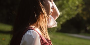Young woman in traditional clothing outdoors