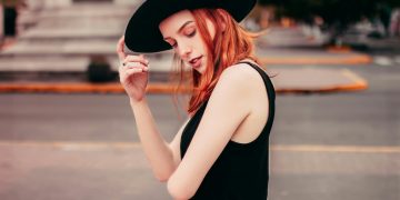 woman wearing black hat photo