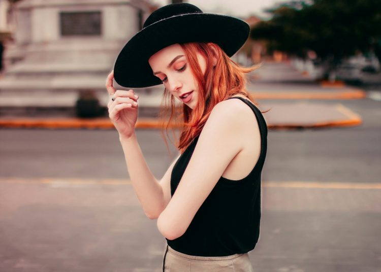 woman wearing black hat photo